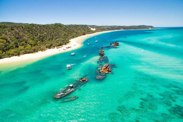 A number of sunken ships at Moreton Island off the coast of Brisbane in Queensland, Australia. These shipwrecks are located just north of Tangalooma Island Resort